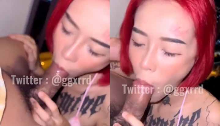 คลิปหลุดทวิตเตอร์ @ggxrrd สาวสักลายสุดฮาร์ดคอร์ ผมสีแดง โชว์สกิลรีดน้ำควยผัวที่ระเบียง