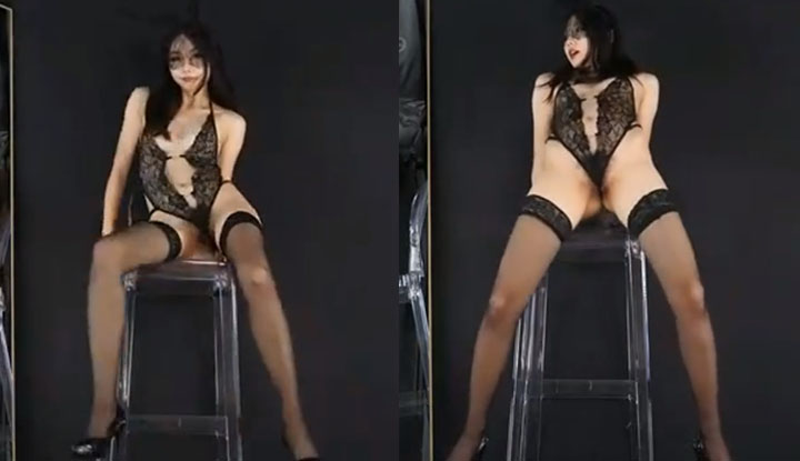 Xin Lei, the leader of the glamorous dance troupe, dressed up as a sexy lace bunny girl with long legs.