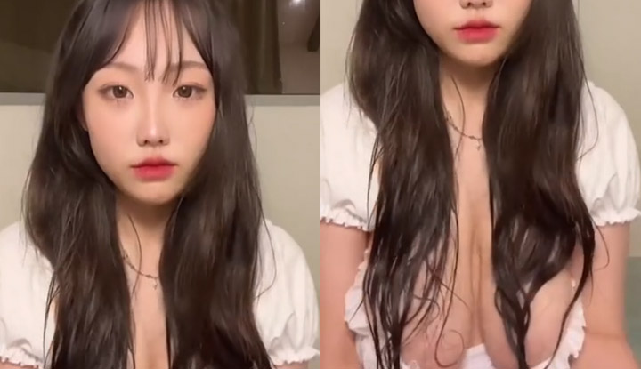Uma bela jovem coreana com uma aparência muito pura, com um toque de mistério muito sedutor.