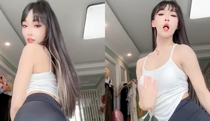 long-haired, slender young lady's sexy dance selfie