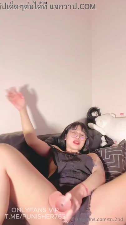a young thai girl with glasses tn.2nd (tn.2na) is a hot thai teenager who masturbates and shows off her pussy with a fake penis.